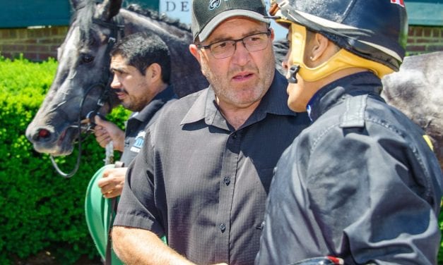 Who leads latest Top Midlantic jockey, trainer ranks?