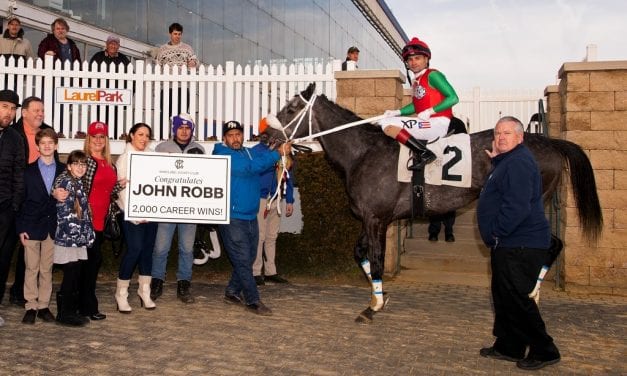 Who leads latest Top Midlantic jockey, trainer ranks?