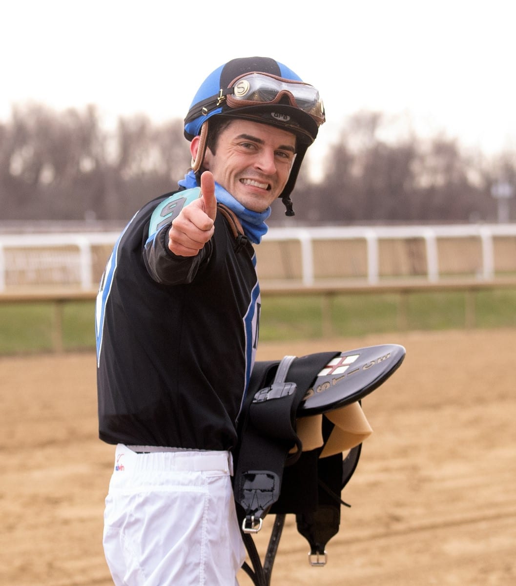 Thumbs up for leading rider Sheldon Russell. Photo Jim McCue, Maryland Jockey Club. Sheldon Russell