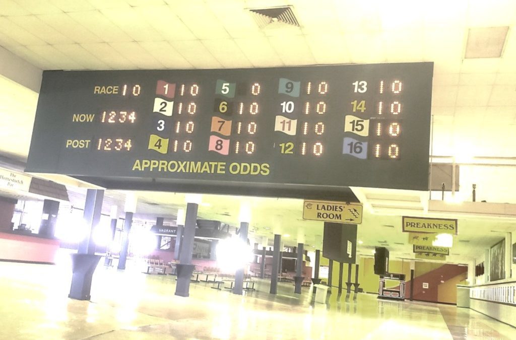 July wagering handle down slightly